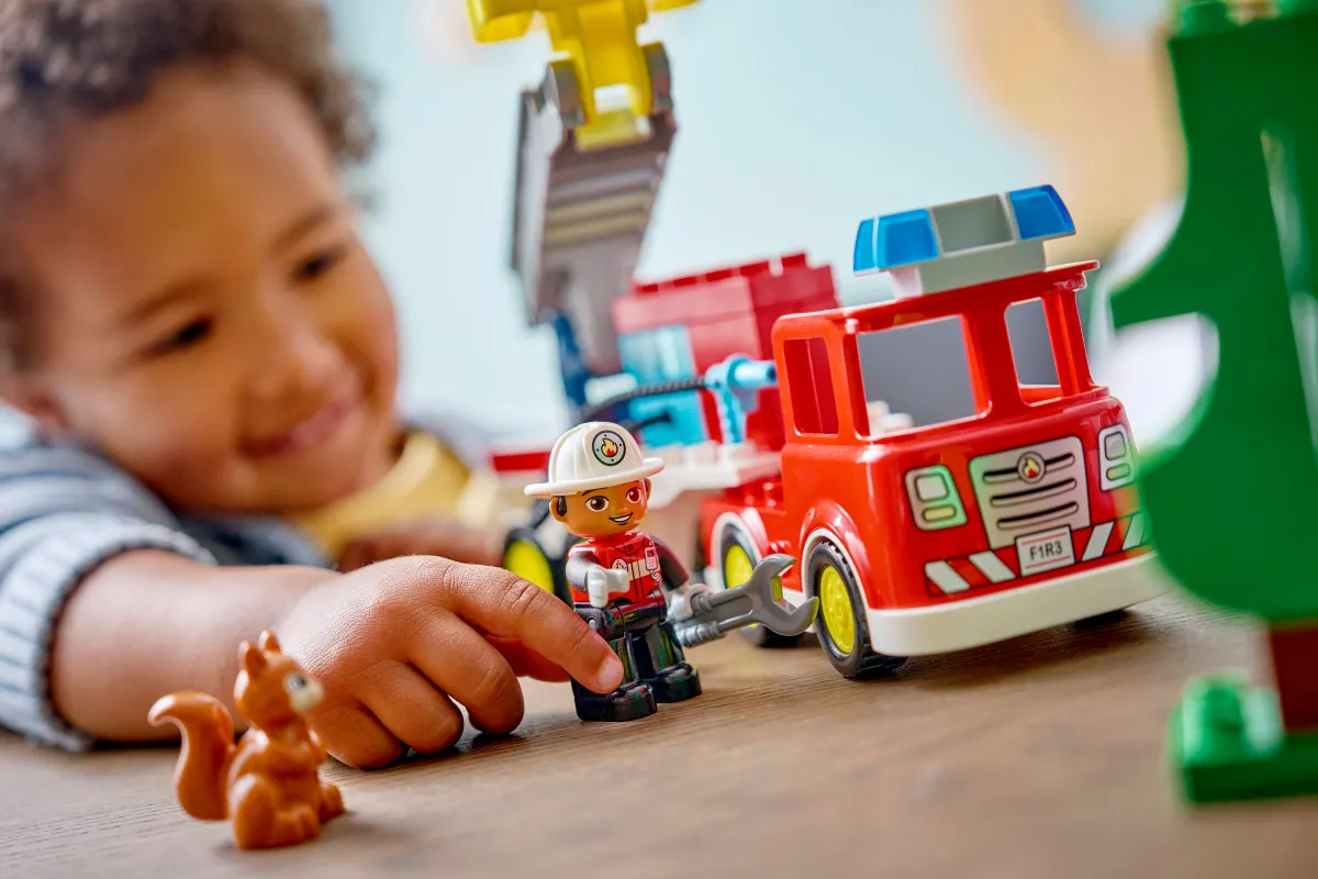 Fire Truck with Hose and Firefighter - Image 4